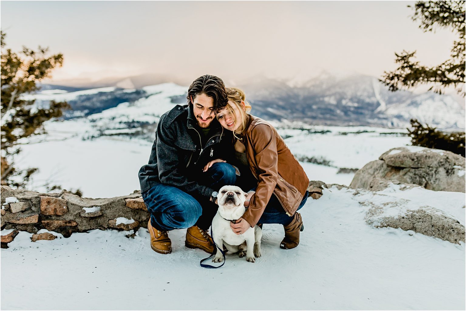 couples engagement session with their dog in the beautiful mountains of Breckenridge colorado at sapphire point overlook