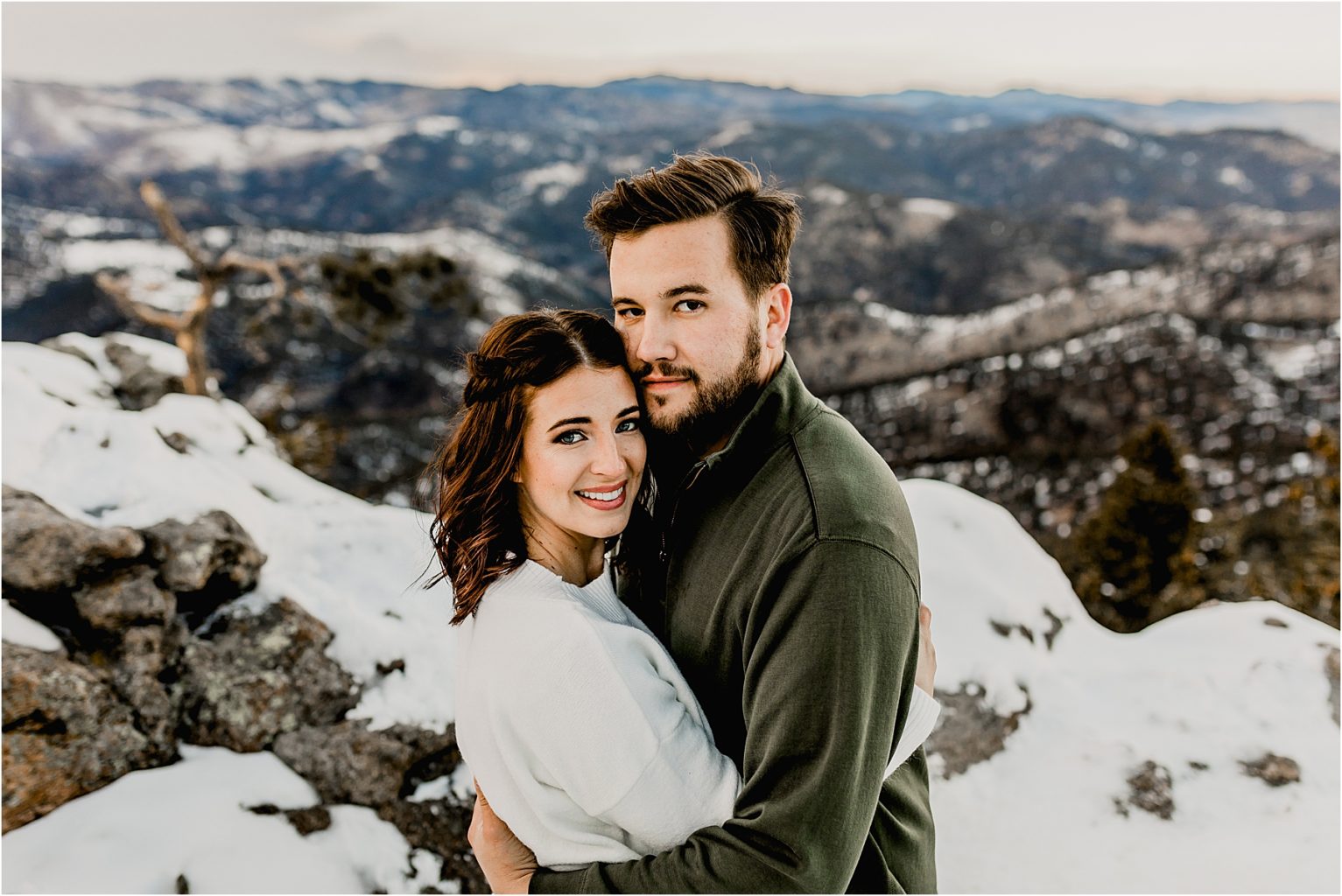 beautiful engagement session of a couple in the snowy colorado mountains