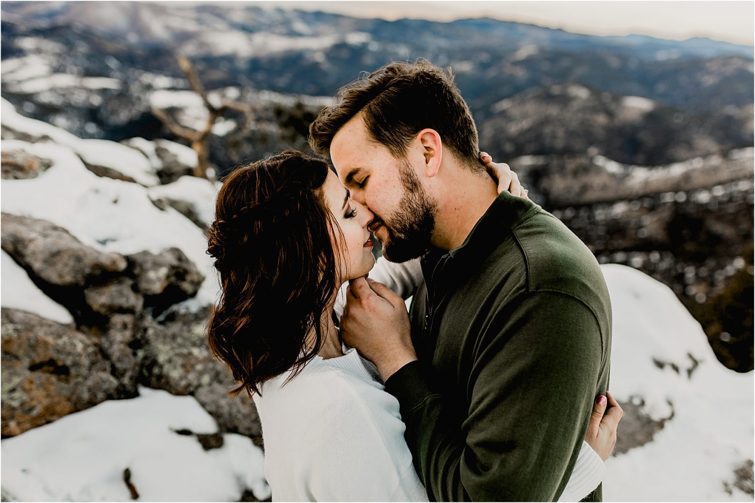 beautiful engagement session of a couple in the snowy colorado mountains