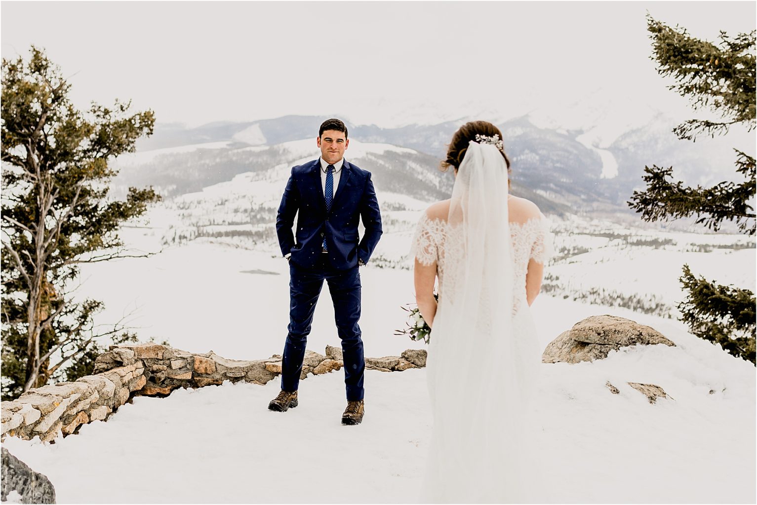 groom waiting for his bride at sapphire point overlook in Dillon colorado
