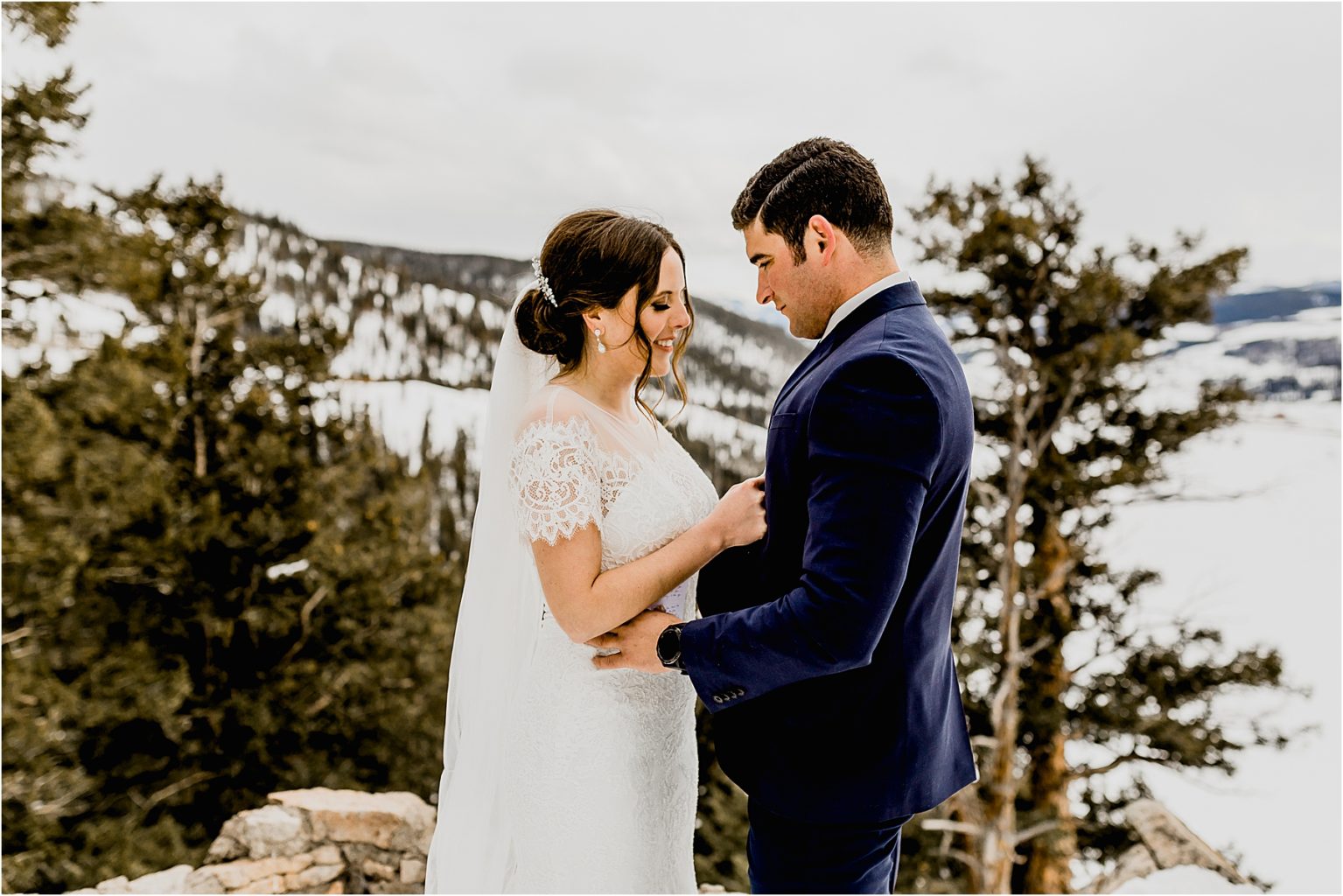 couple saying vows for colorado elopement in mountains