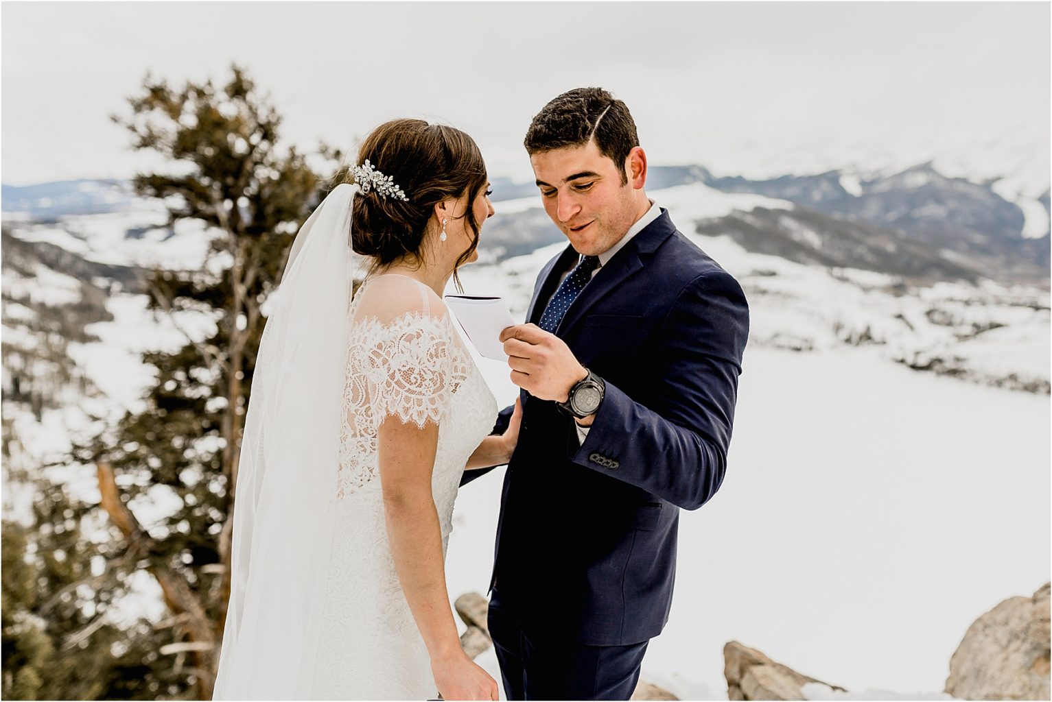 couple saying vows for colorado elopement in mountains