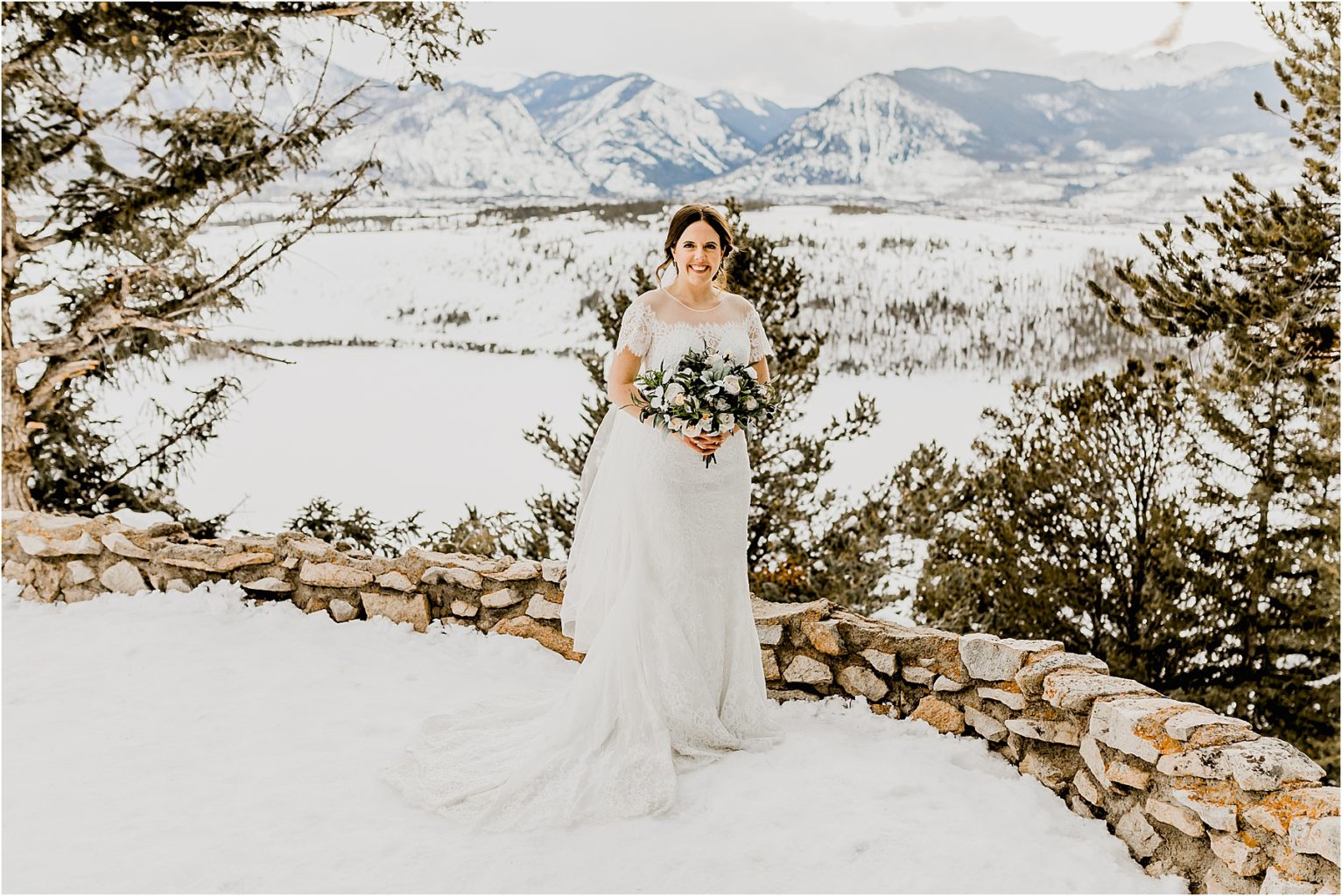 beautiful bride with a bouquet at sapphire point overlook