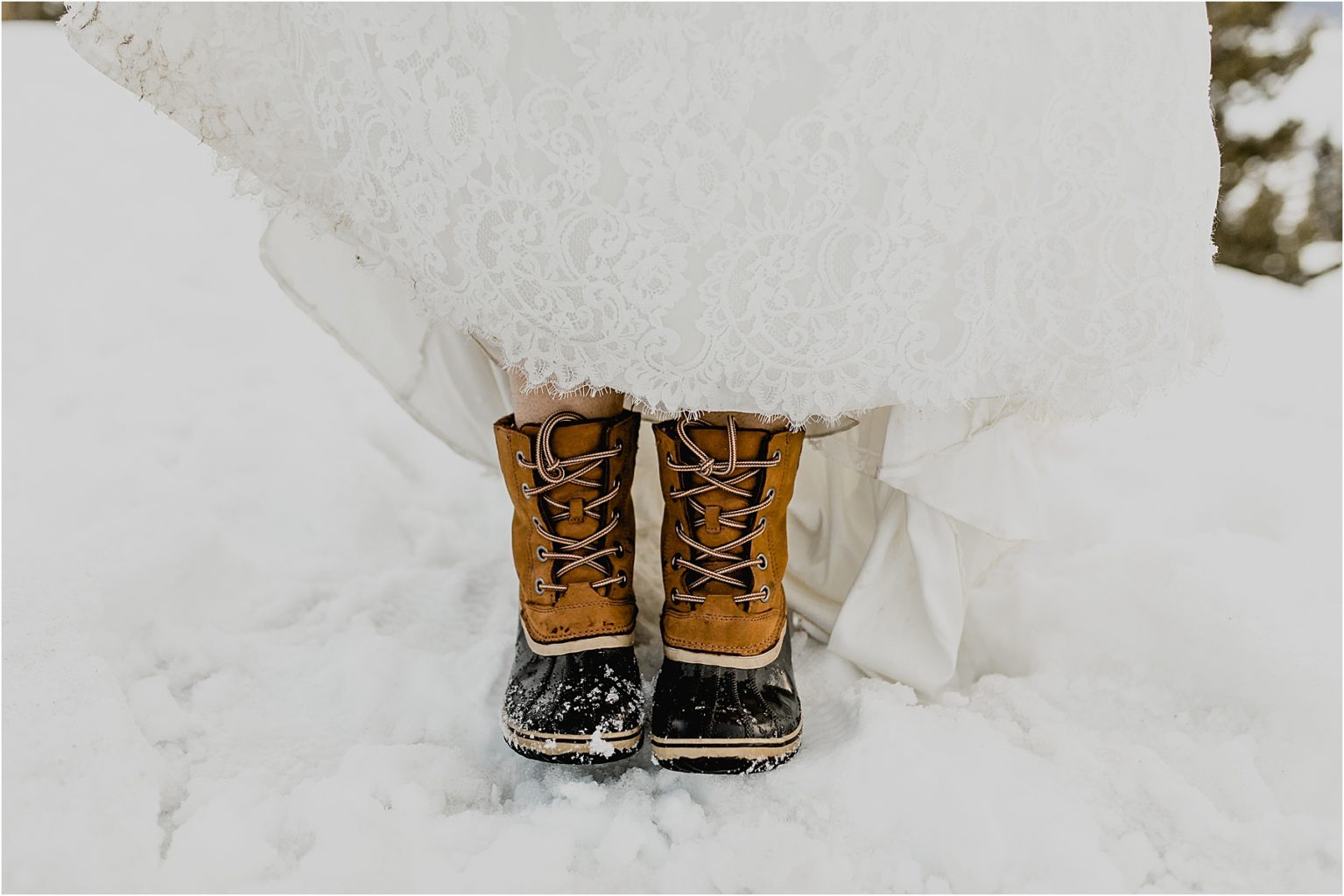 brides boots in the snow for her adventure elopement in breckenridge colorado