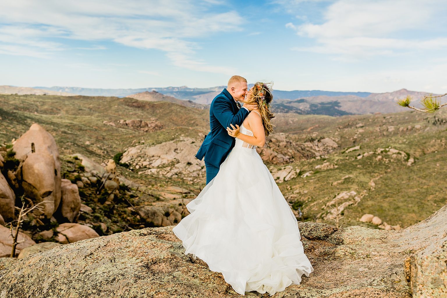 bride and groom smiling for Colorado elopement in the outdoors