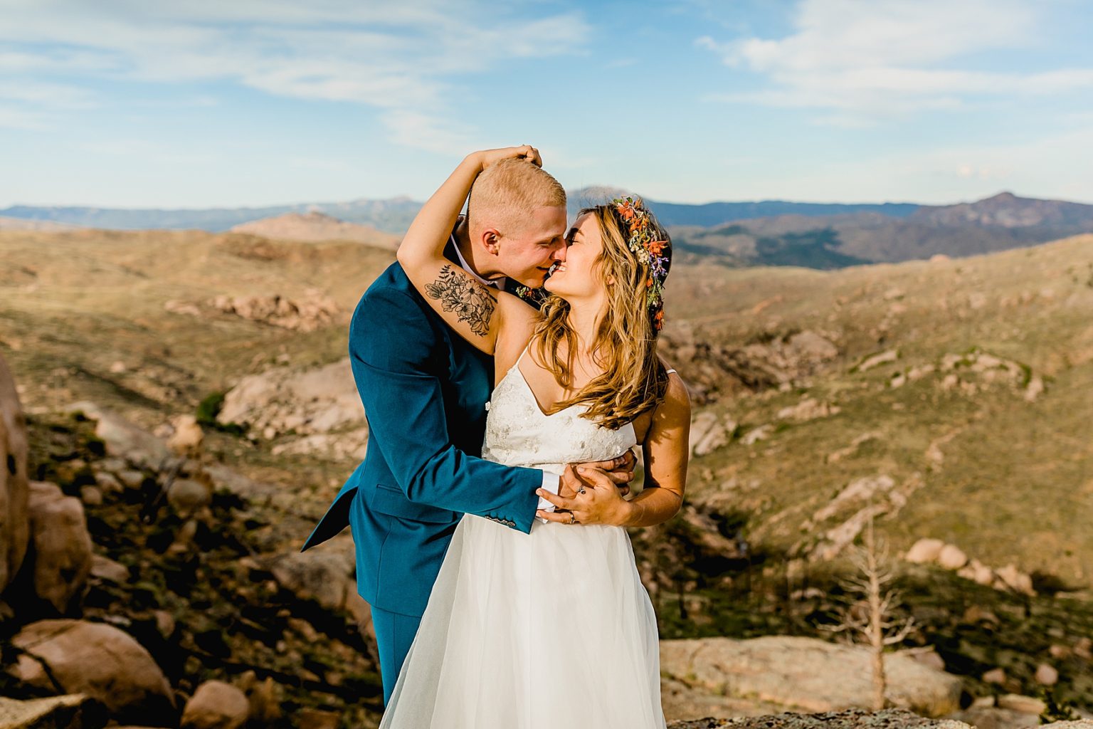 bride and groom smiling for Colorado elopement in the outdoors