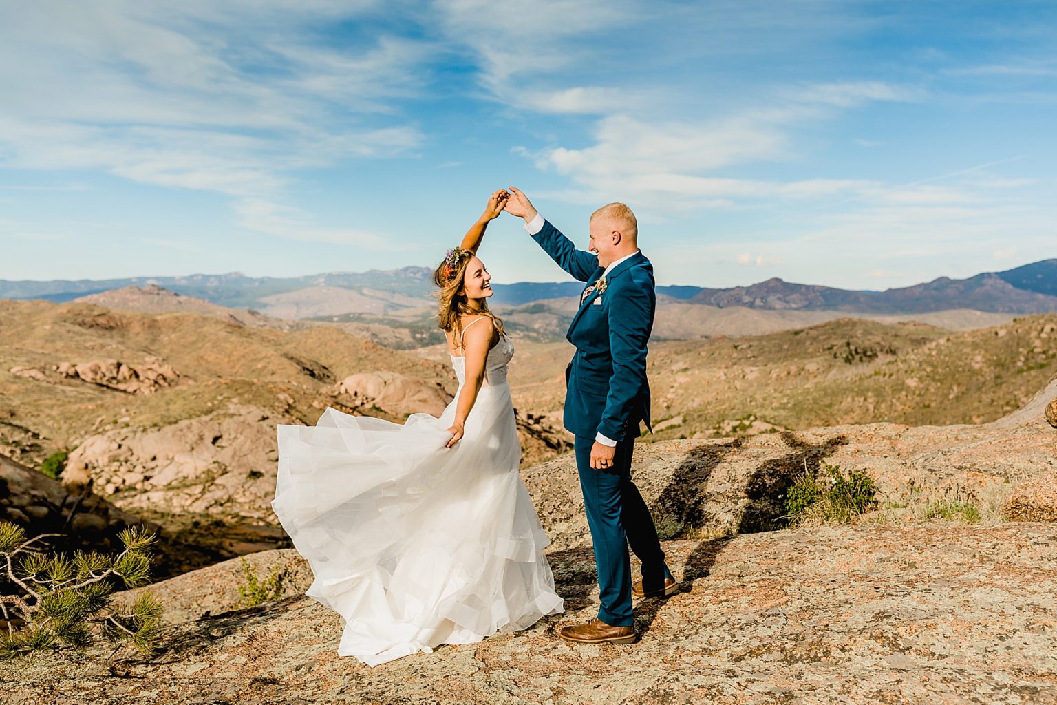 bride and groom dancing in the Colorado mountains for elopement