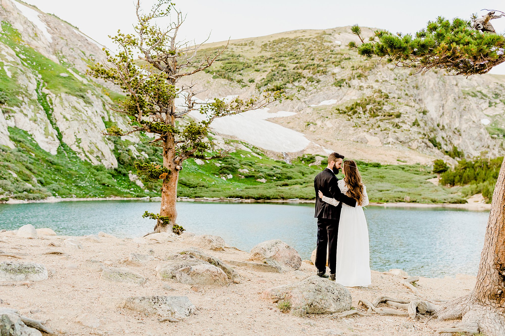 couple walks to colorado glacier for their outdoor elopement