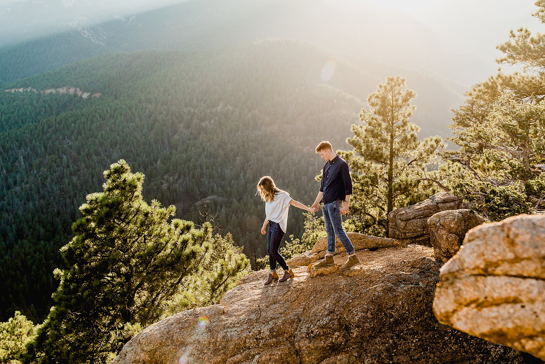 colorado mountain engagement photos, lauren casino photographs a couples engagement session as they walk through the mountains