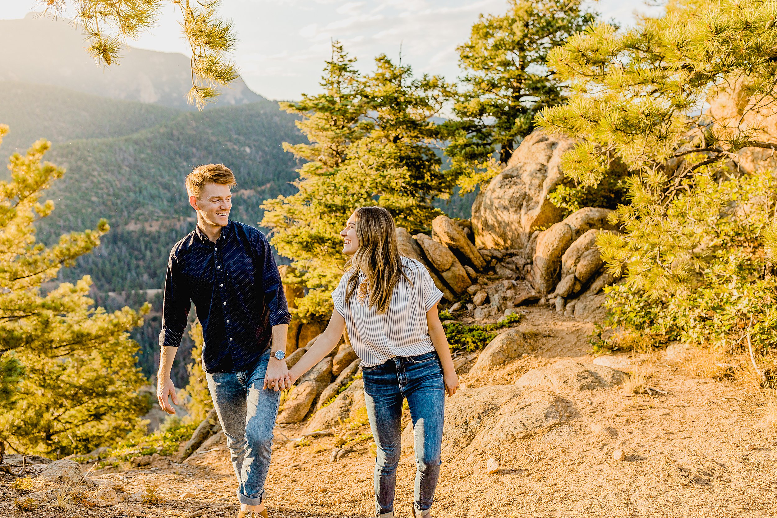 colorado mountain engagement photographer captures couples engagement photos with beautiful mountain scenery at sunset
