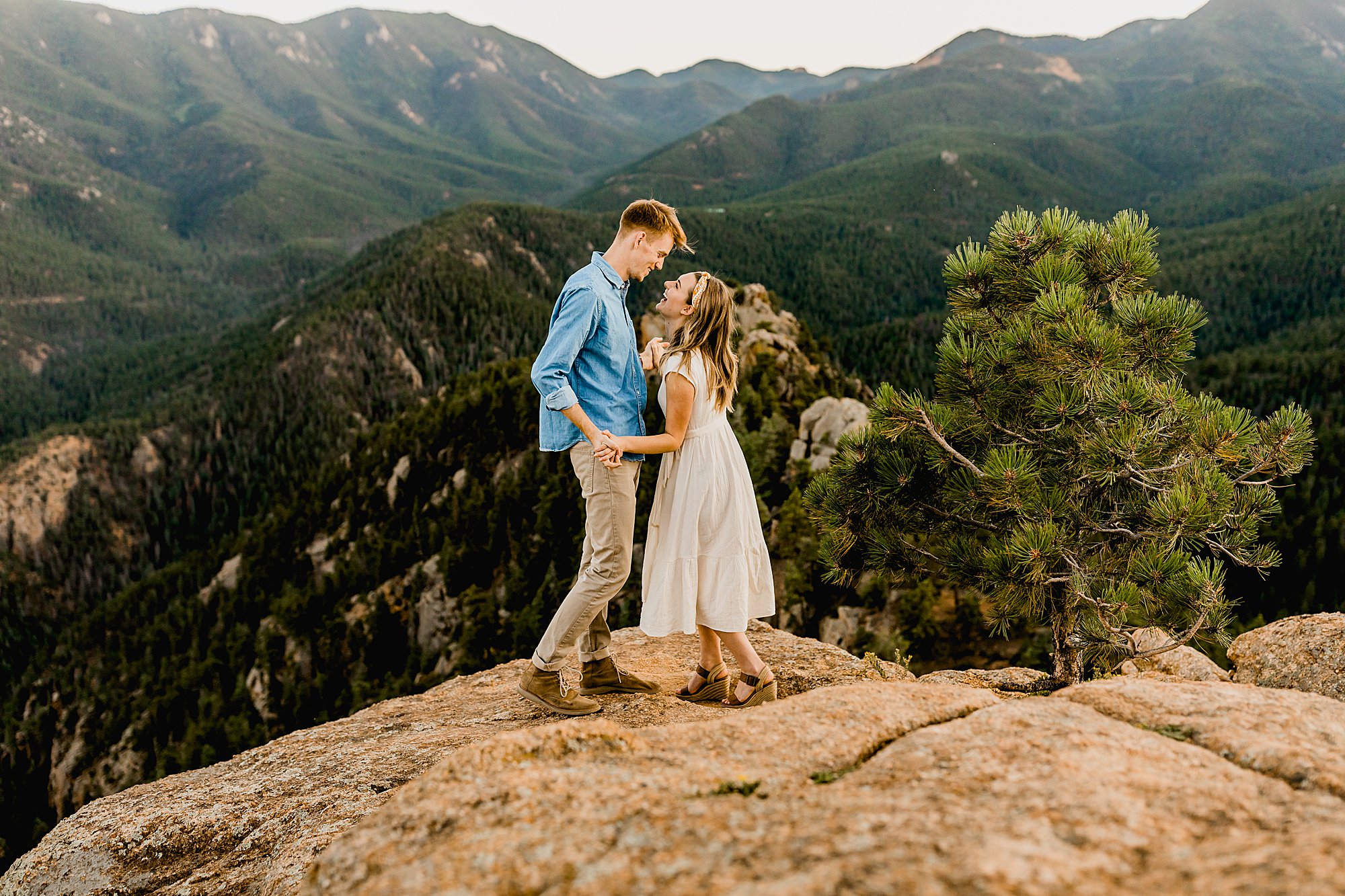 colorado mountain engagement photos, lauren casino photographs couple having fun in the stunning colorado mountains