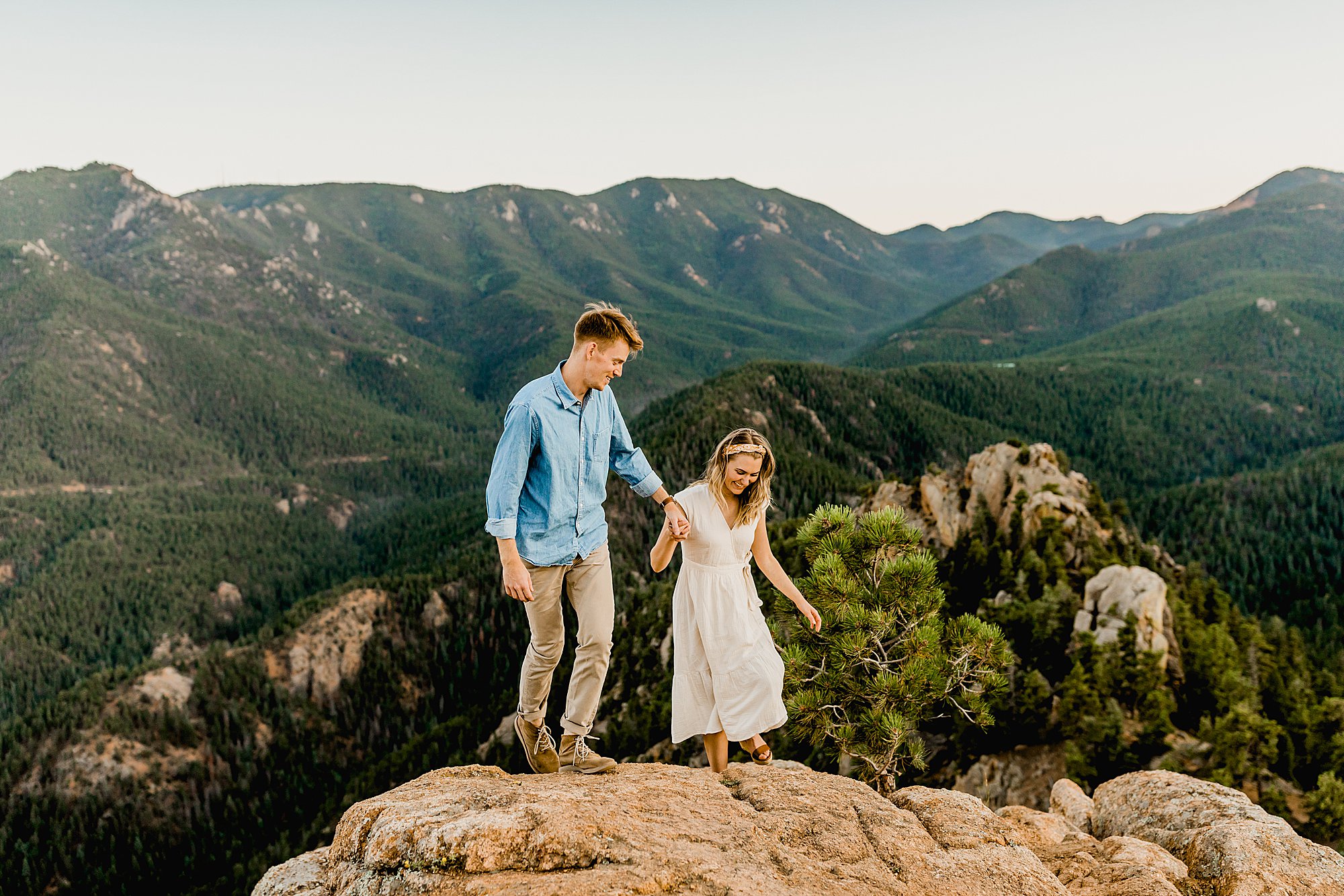 colorado couple hikes for their engagement photos in cheyenne mountain