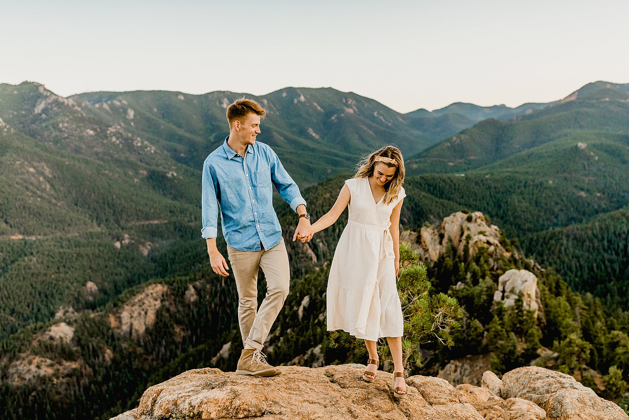 colorado couple hikes for their engagement photos in cheyenne mountain