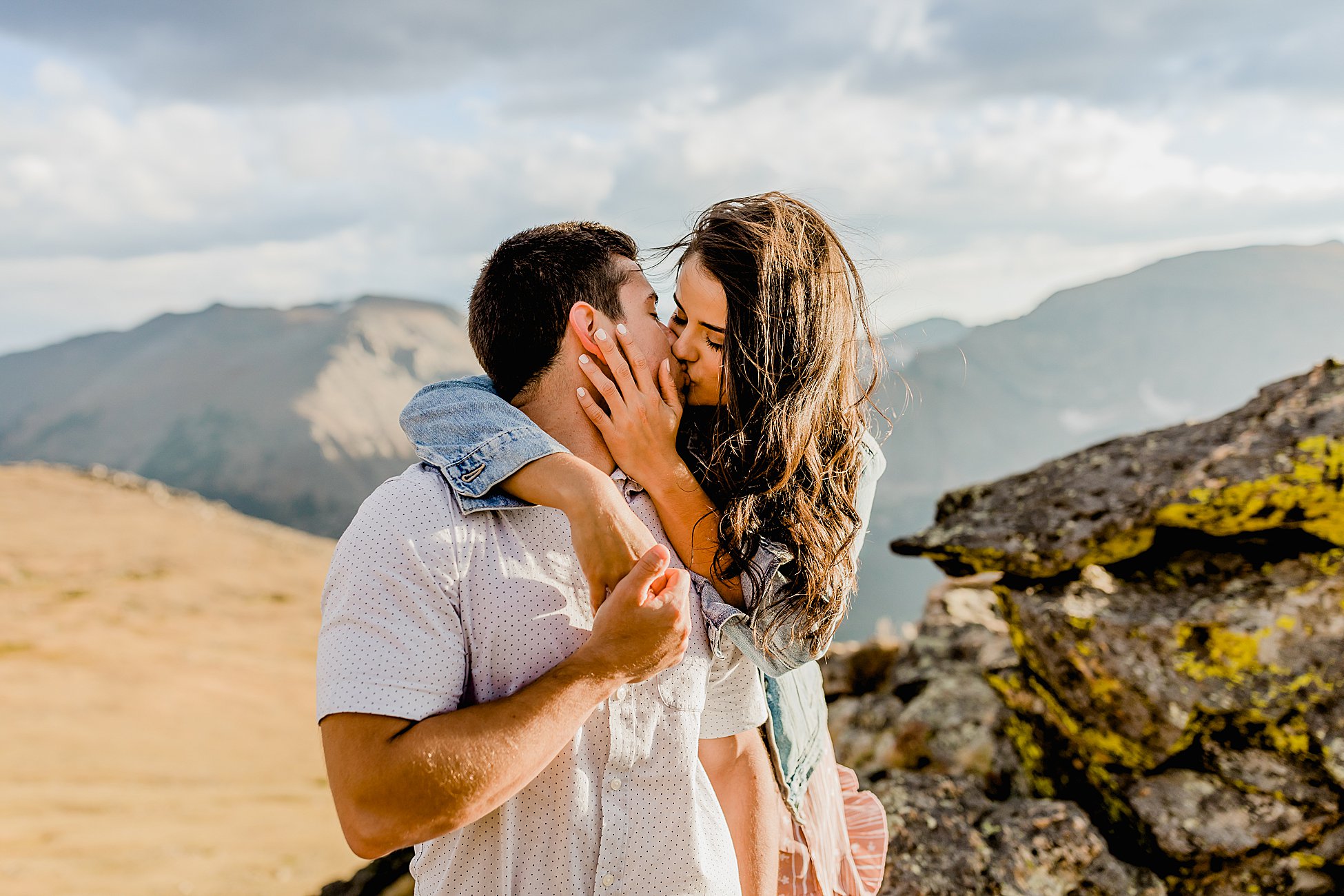 colorado couple has engagement photos taken in rocky mountain national park with beautiful mountain scenery