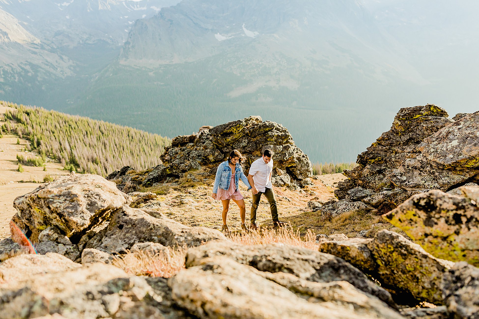 colorado couple has engagement photos taken in rocky mountain national park with beautiful mountain scenery